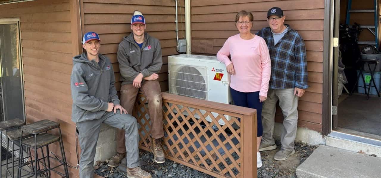 benny and janet menton with new mitsubishi heat pump in glencoe, mn